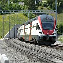 P1020874  Une RABe 511 (la 014 avec baptisée Wettingen) sort du tunnel du Bözberg avec un IR 36