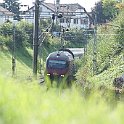 DSC13129  La 008 avec un IC Genève-Aéroport - St. Gall dans la courbe de Neyruz.