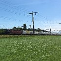 IMG 5112  Longue rame de wagons de type Sgnss avec container Inofreight pour transport de copeaux de bois.