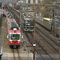 DSC05879  A l'occasion de l'adieu à la voie de 750mm sur le WB, sortie parallèle de la gare de Liestal entre l'Ae 6/6 11407 (Mikado1244) et du train officiel