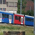 Tram de la ligne 6 Fischermätteli - Worb Dorf à Ostermundigen. Bernmobil a repris du RBS l'exploitation de la ligne Zytglogge - Worb. Dans la foulée, les composition ont été allongée d'un élément surbaissé mis aux couleurs de la compagnie alors que le reste a gardé le bleu historique.